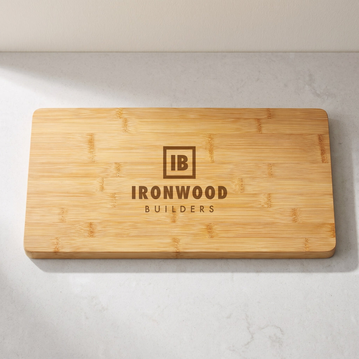 Custom Logo Bamboo Charcuterie Board 19¾" x 8" with sample engraved logo