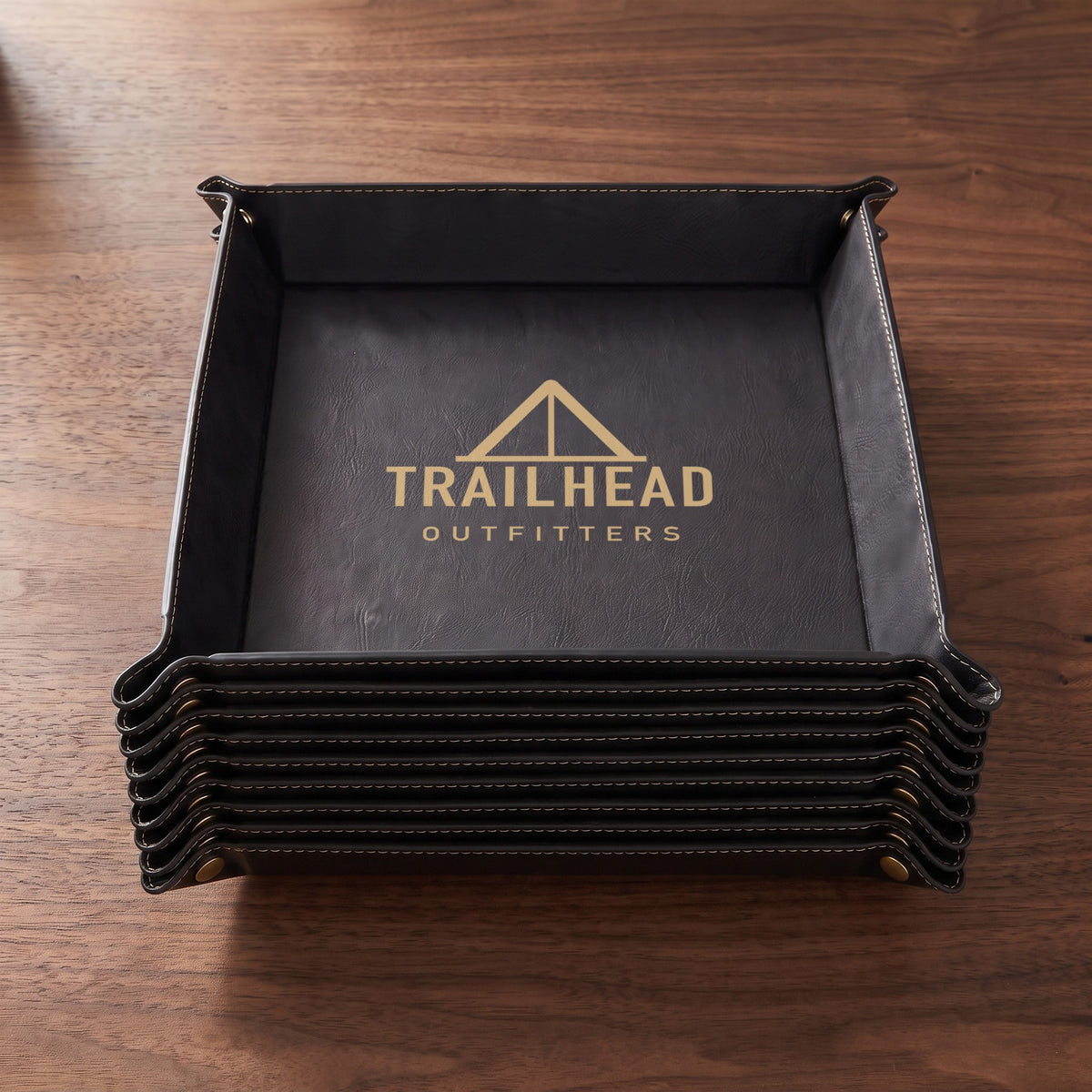 Custom Logo Leatherette Valet Tray – bulk order: a stack of 9" Black/Gold trays, gold engraved sample logo on the top tray