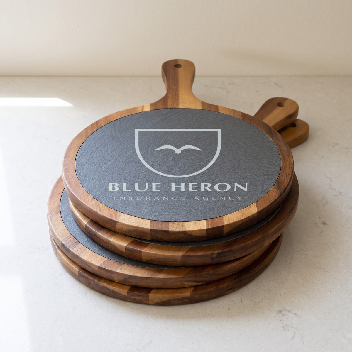 Custom Logo Round Slate & Acacia Serving Board with Handle – bulk stack of boards, engraved with the same sample logo