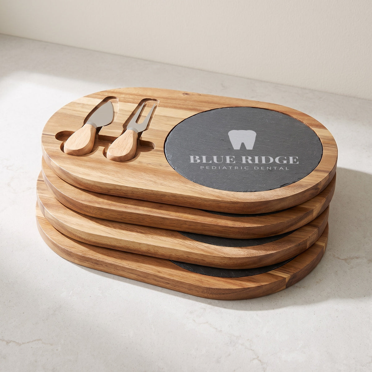 Custom Logo Slate & Acacia Cheese Board Set – Oval – bulk stack of oval cheese sets, engraved with the same sample logo