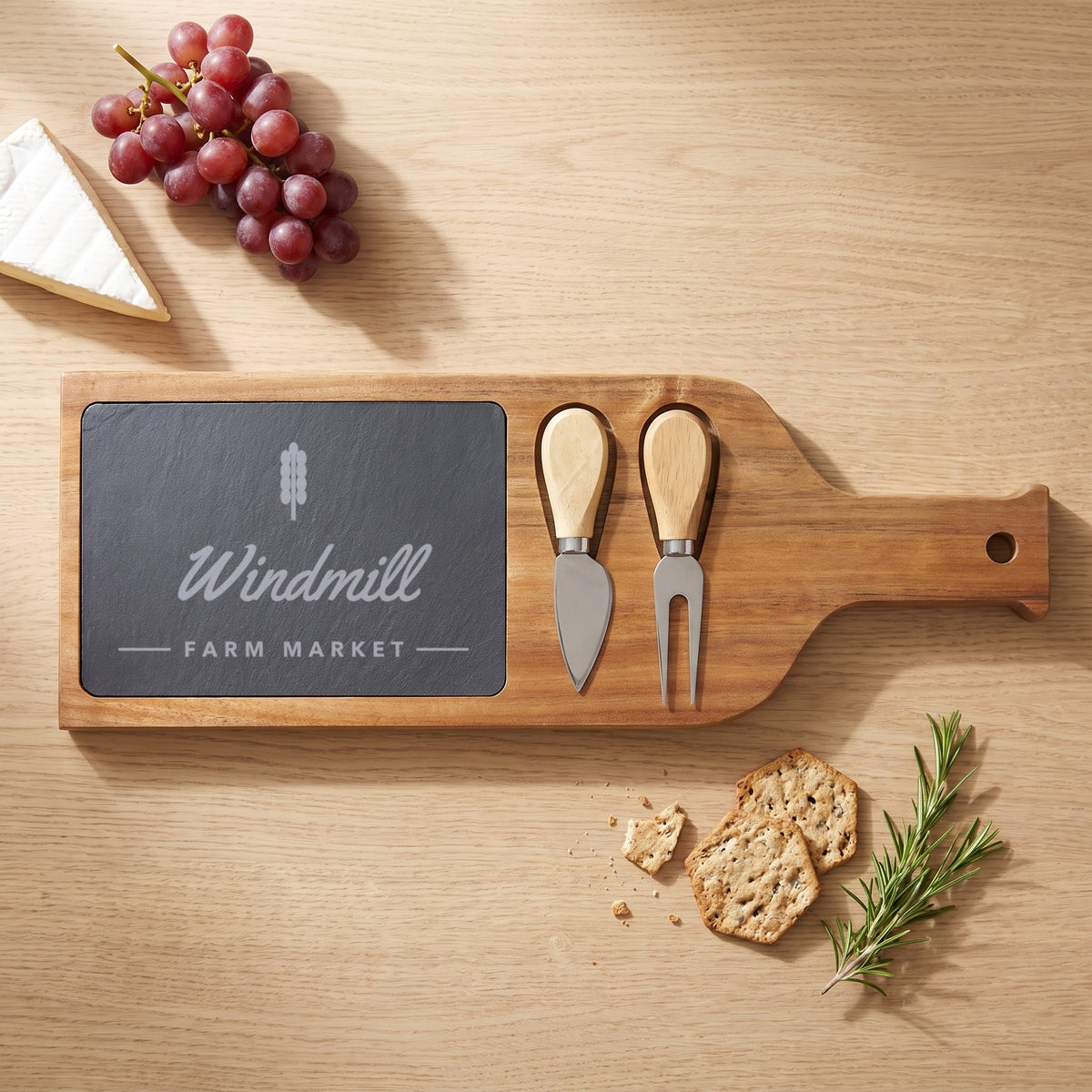 Custom Logo Slate & Acacia Serving Board, wine bottle shape with 2 cheese tools and an engraved sample logo on the slate