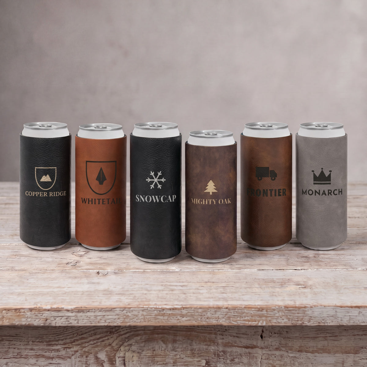 Custom Logo Leatherette Slim Can Coolers – all 6 colors in a row, each engraved with a different sample logo