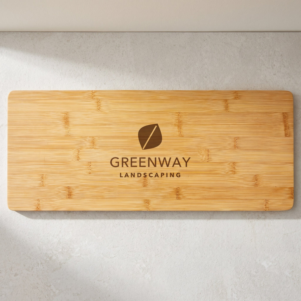 Custom Logo Bamboo Charcuterie Board 19¾" x 8" with sample engraved logo