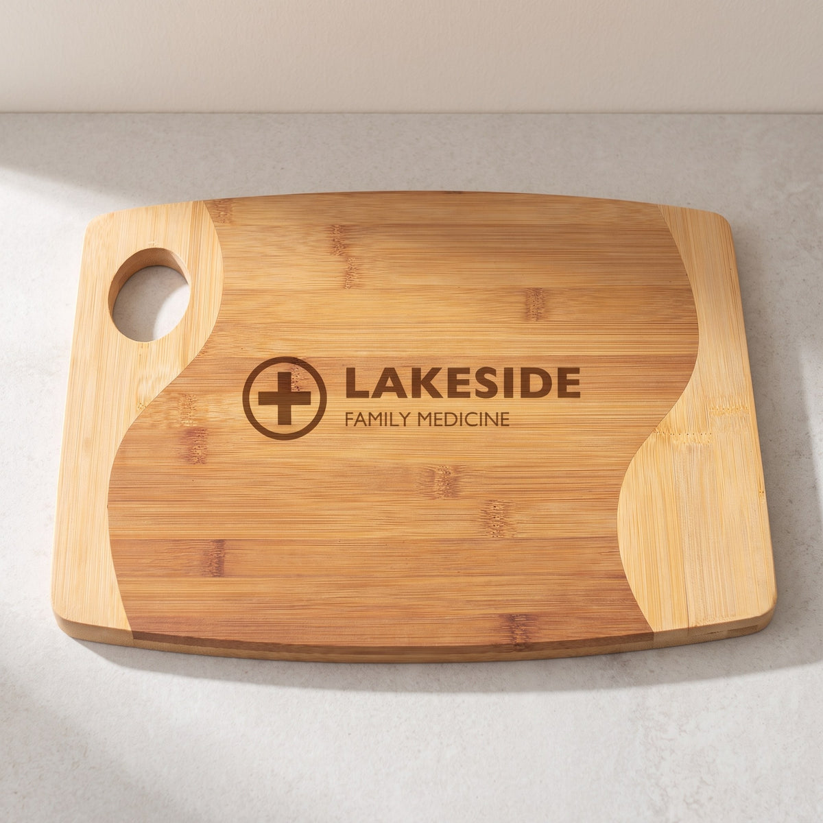 Custom Logo Two-Tone Bamboo Cutting Boards with Handle – 13¾" x 11" with sample engraved logo
