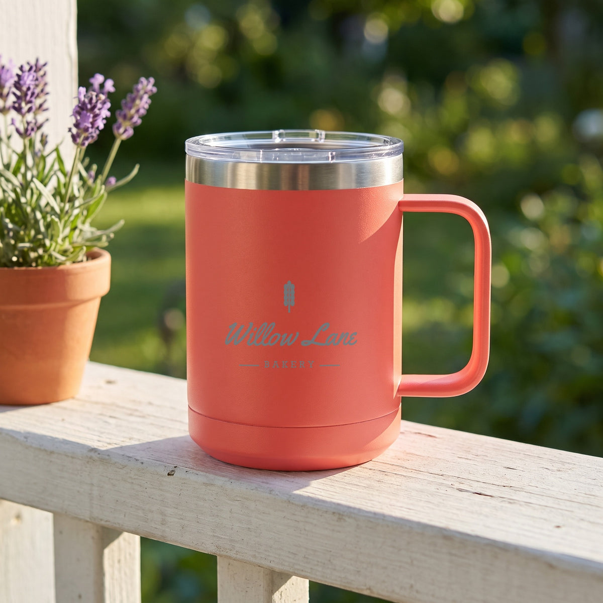 Custom Logo Polar Camel 15 oz Insulated Mug, coral with an engraved sample logo on a porch railing