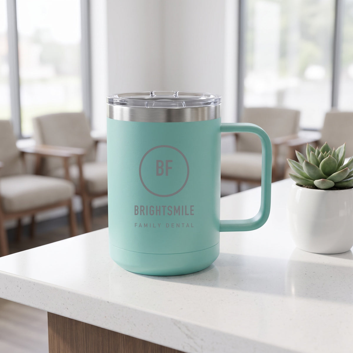 Custom Logo Polar Camel 15 oz Insulated Mug, teal with an engraved sample logo at an office reception desk