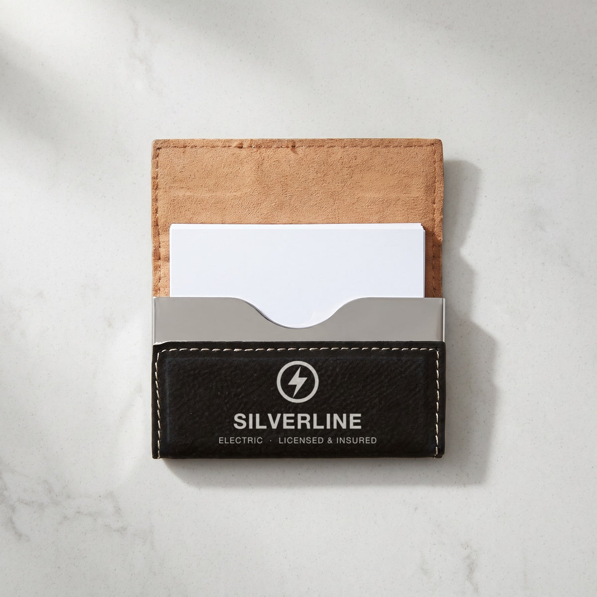 Custom Logo Leatherette Business Card Holder – Black/Silver open, showing the metal card clip, with silver engraved sample logo