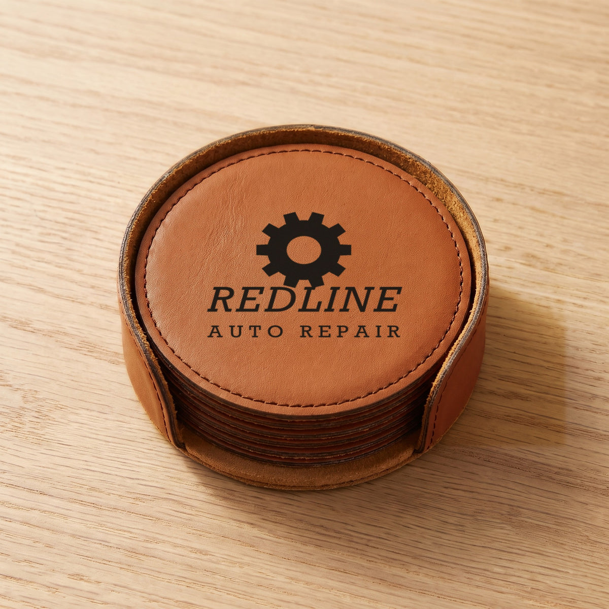 Custom Logo Leatherette Coaster Set – round Rawhide set with dark engraved sample logo