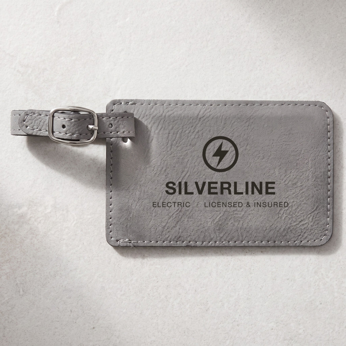 Custom Logo Leatherette Luggage Tag – Gray with dark engraved sample logo