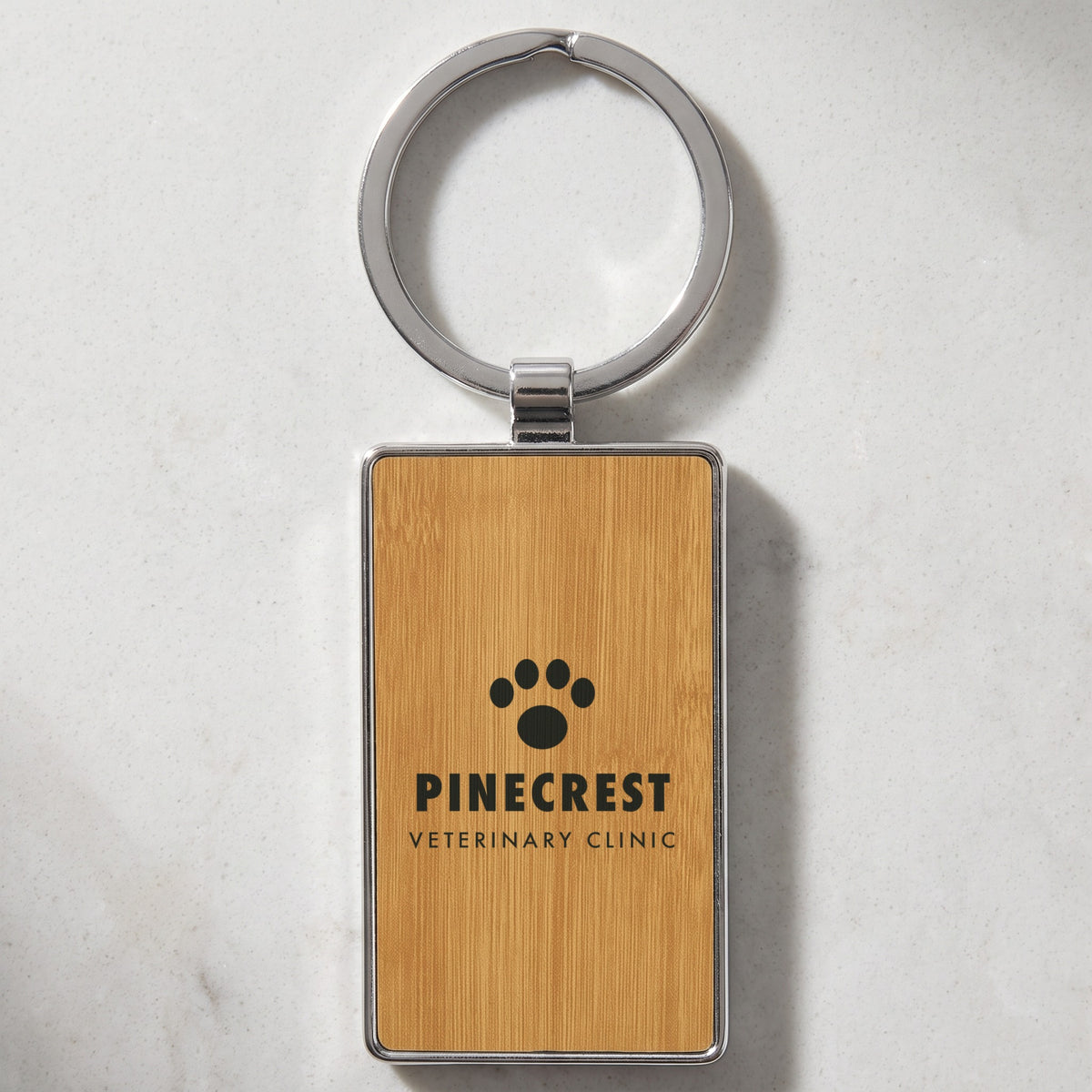 Custom Logo Leatherette & Metal Keychain – Rectangle, Bamboo with an engraved sample logo