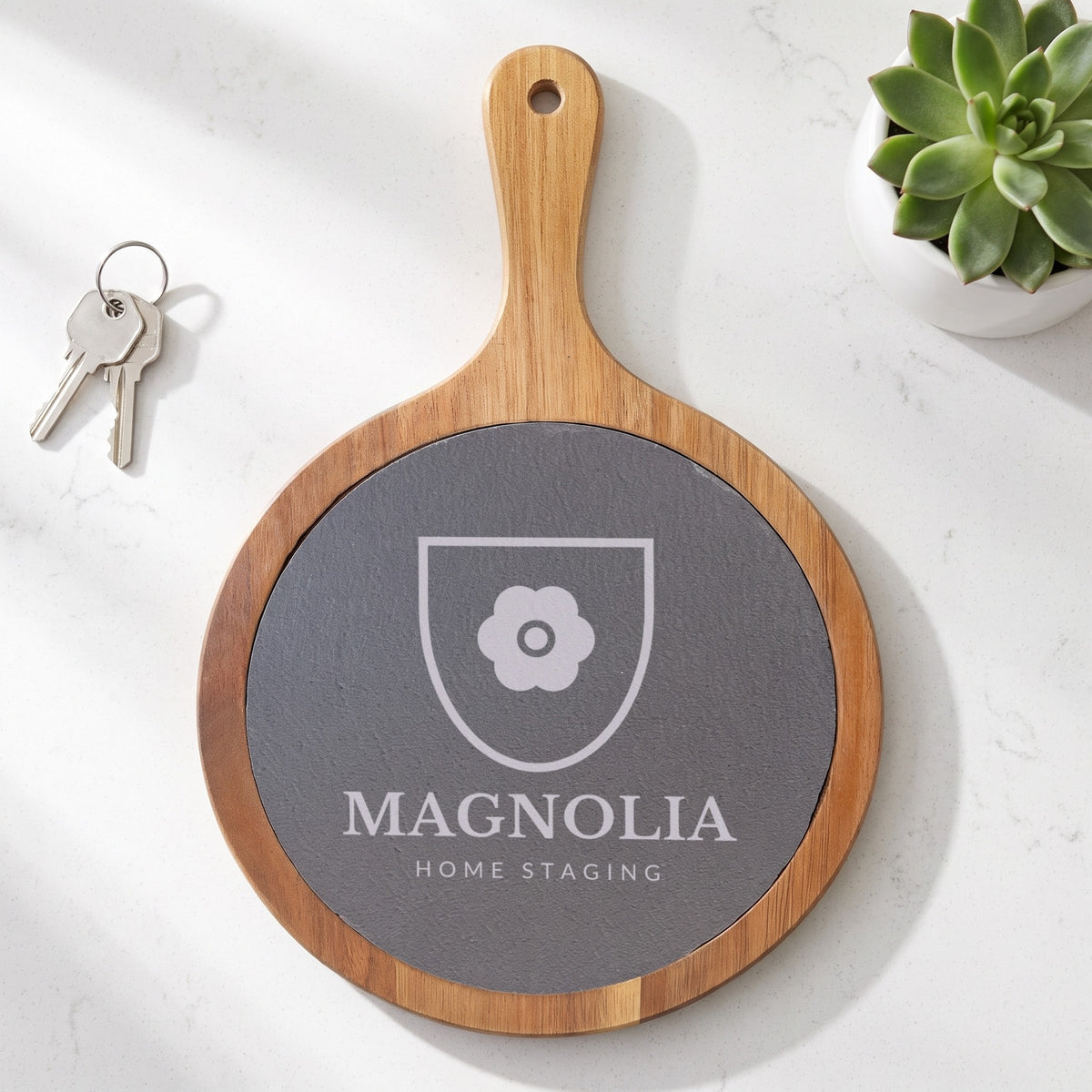 Custom Logo Round Slate & Acacia Serving Board with Handle, 8 1/4 inch board with an engraved sample logo as a realtor closing gift