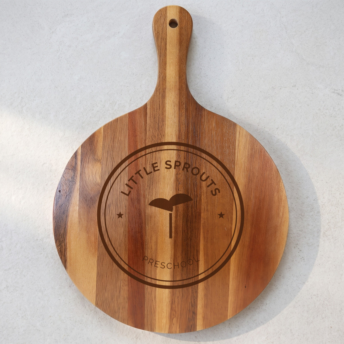 Custom Logo Round Slate & Acacia Serving Board with Handle, sample logo engraved dark brown on the acacia wood back