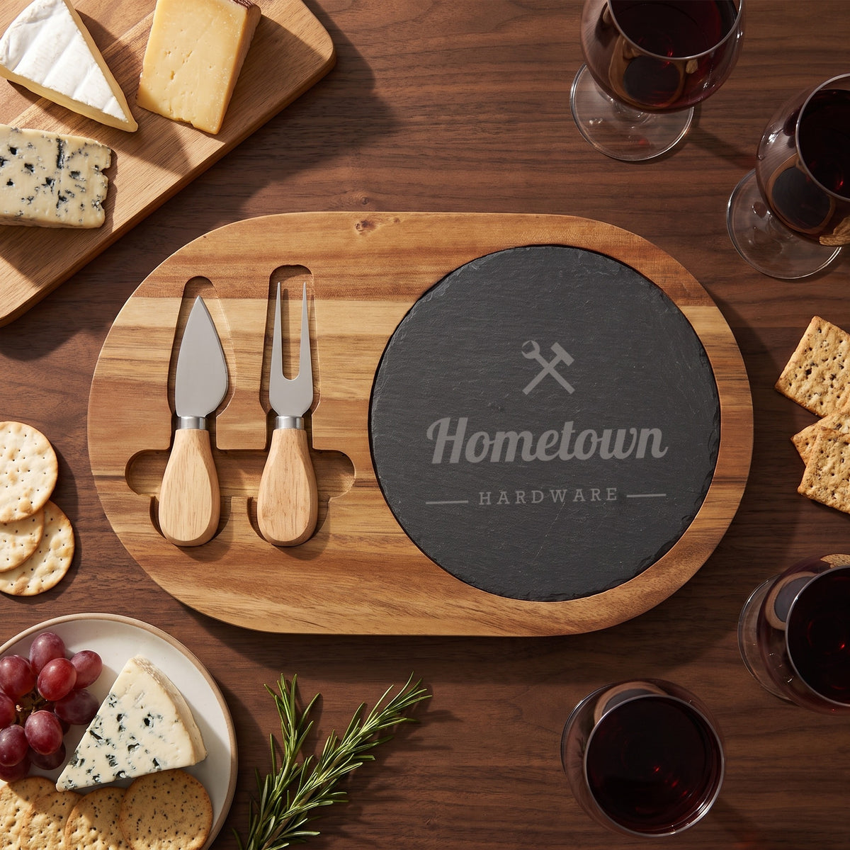 Custom Logo Slate & Acacia Cheese Board Set – Oval, engraved sample logo, served with cheese, crackers and wine
