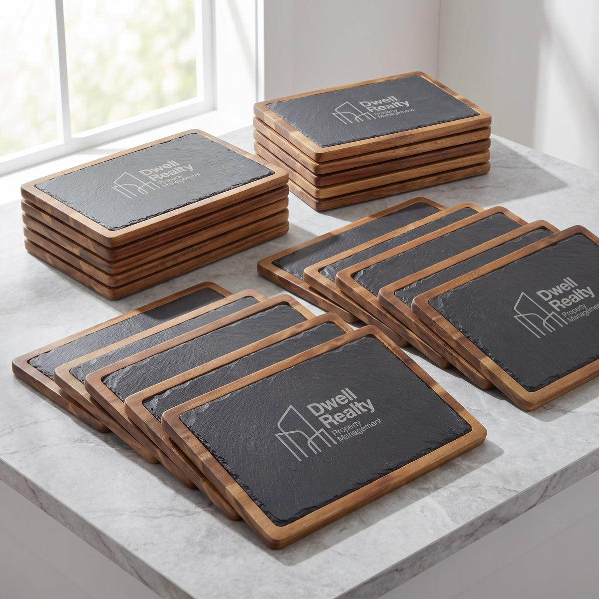 Custom Logo Slate Cheese Boards – bulk order of slate cheese boards, all engraved with the same sample logo