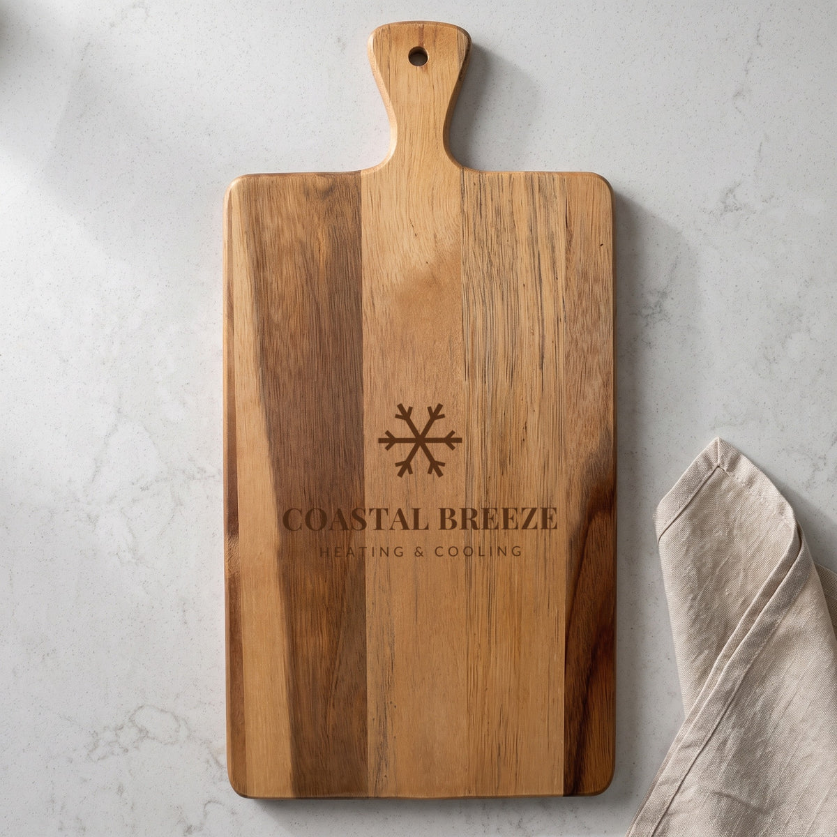 Custom Logo Slate & Acacia Paddle Cutting Board, sample logo engraved dark brown on the acacia wood back