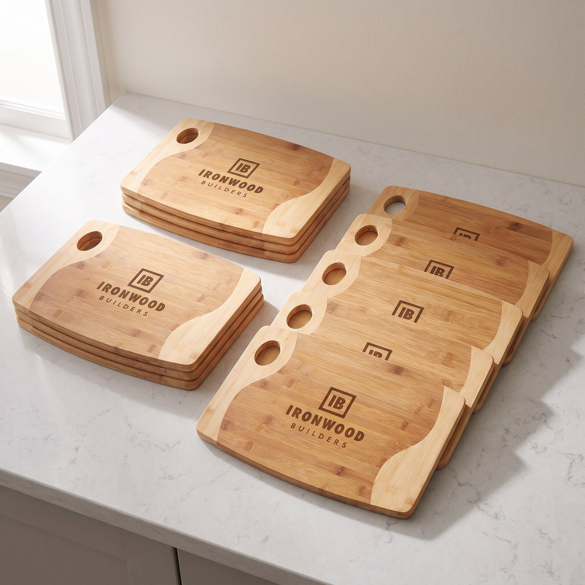 Custom Logo Two-Tone Bamboo Boards with Handle – bulk order of two-tone bamboo boards with handle, all engraved with the same sample logo